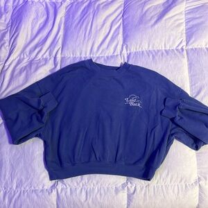 Light blue (purple almost) cropped crew neck.